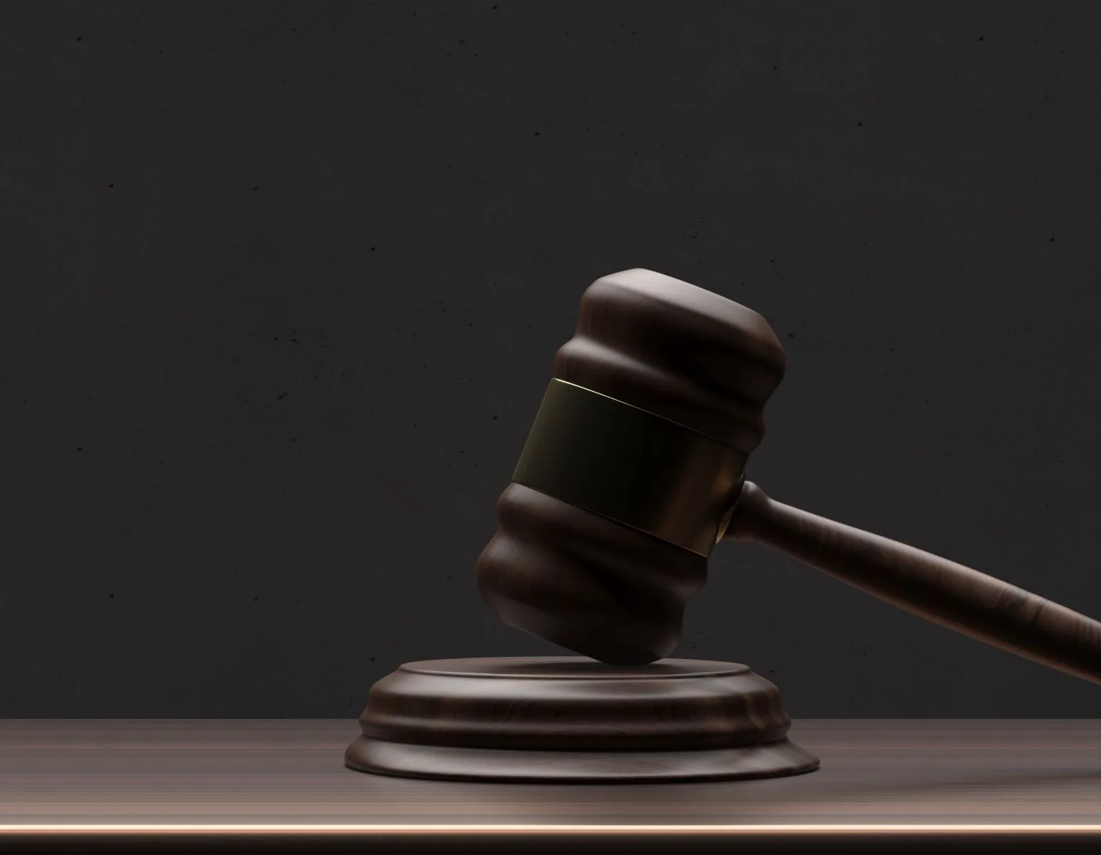 Gavel rests on judge’s bench during larceny trial in Grand Rapids