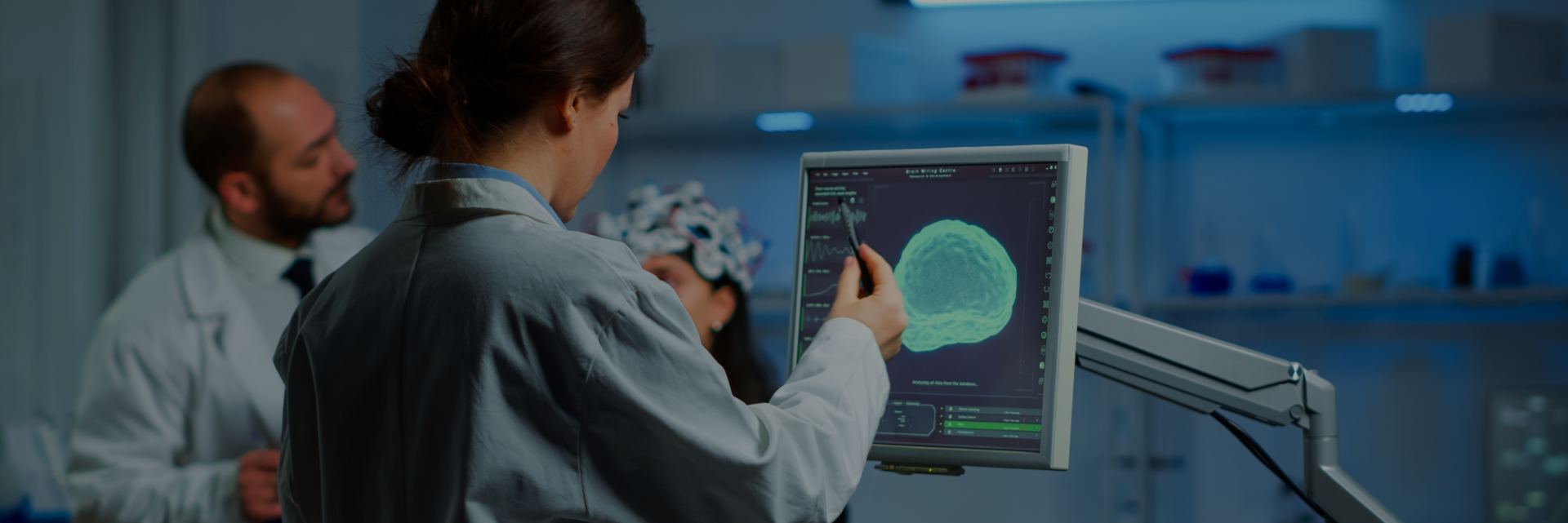 Doctor reviews results from brain imaging scan.