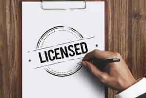 Clipboard image of the word "Licensed" surrounded by a black medallion.